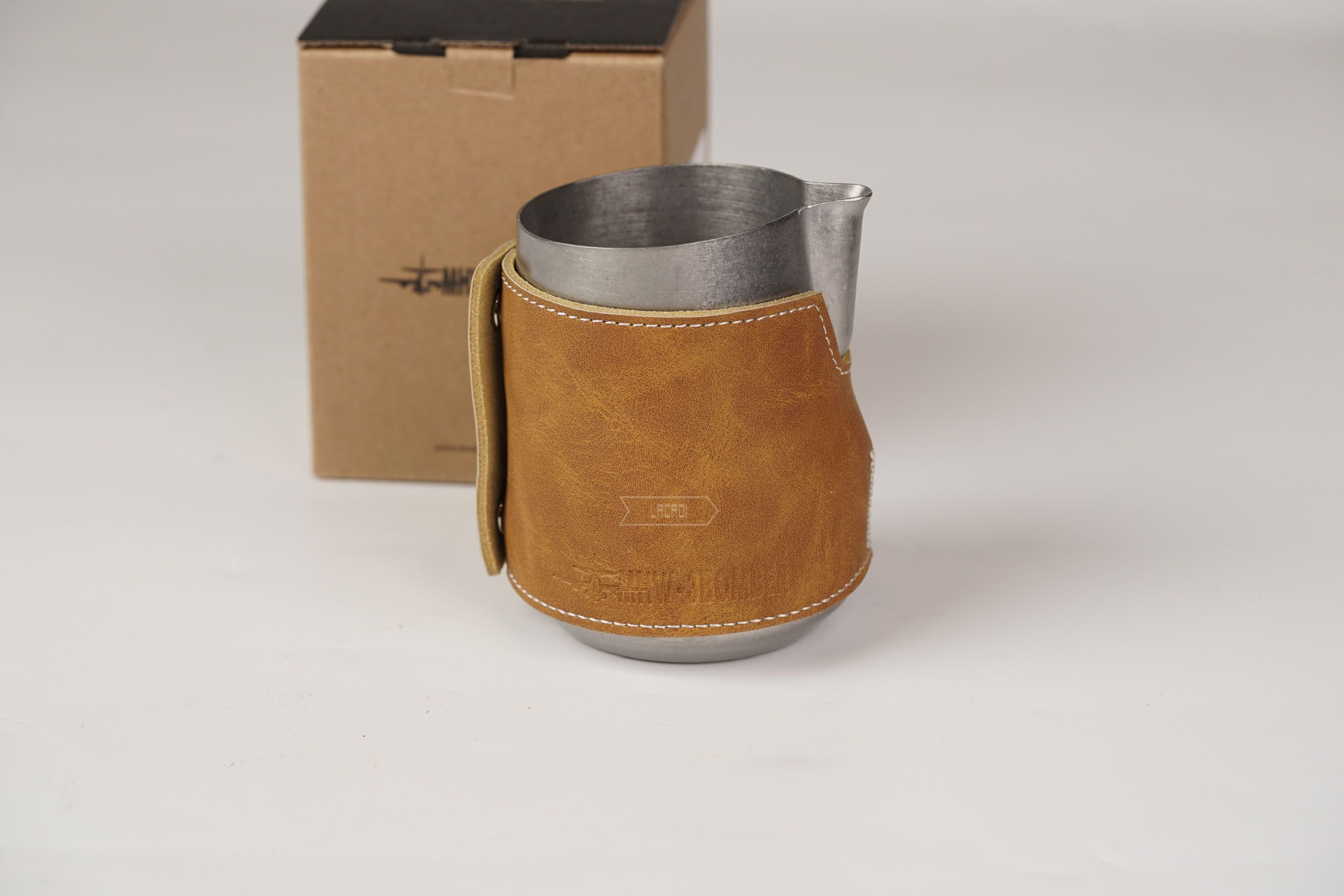 Milk pitcher with leather sheath 520ml - P6010SS